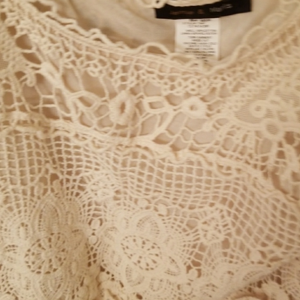 Embroidered sleeveless shirt